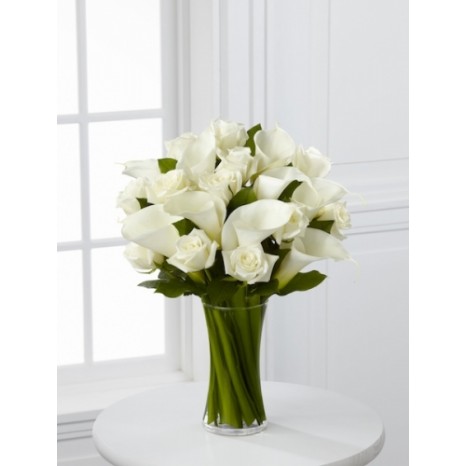 White roses and calla lilies vase