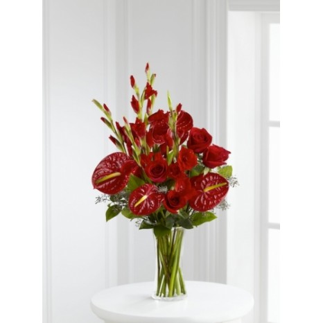 Rich red roses, gladiolus and anthurium