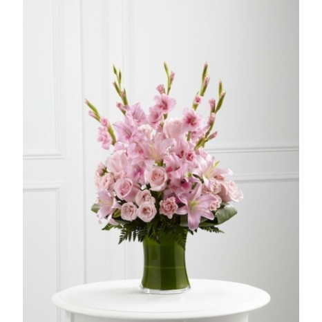 Arrangement of gladiolus, roses and lilies